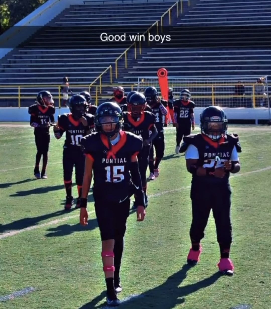 Pontiac Panthers team walking toward the camera together — Good win boys